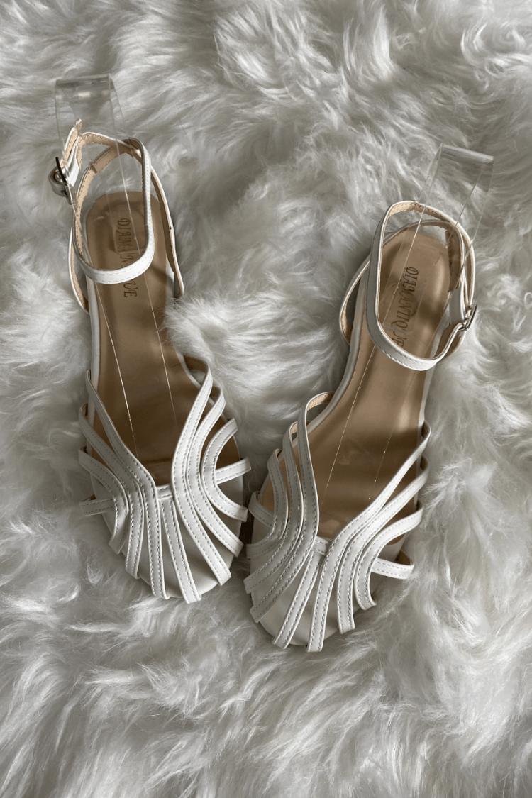SOLE | Sandales plates élégantes tressées pour un look sophistiqué